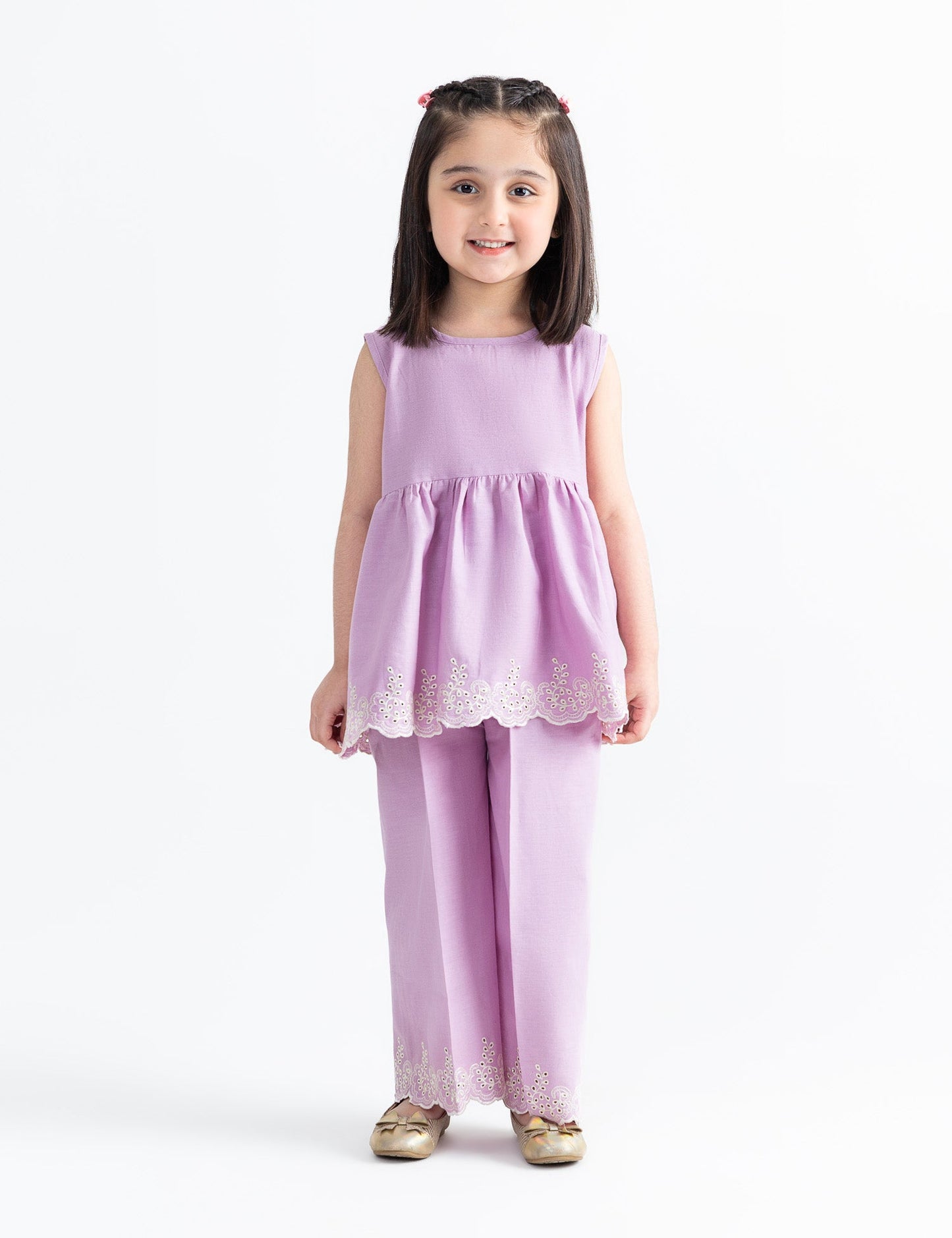 SLEEVELESS EMBROIDERED HEM TOP