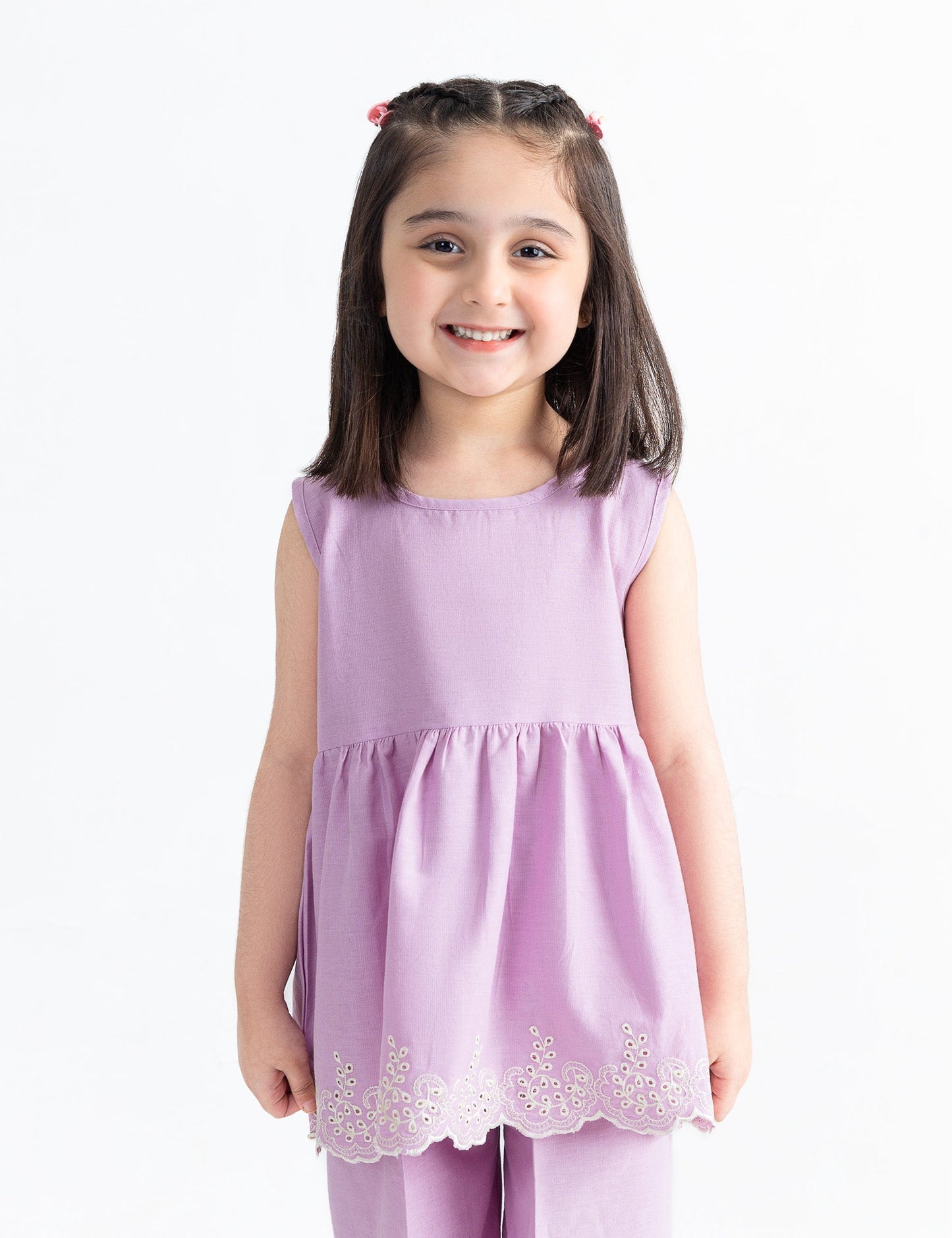 SLEEVELESS EMBROIDERED HEM TOP