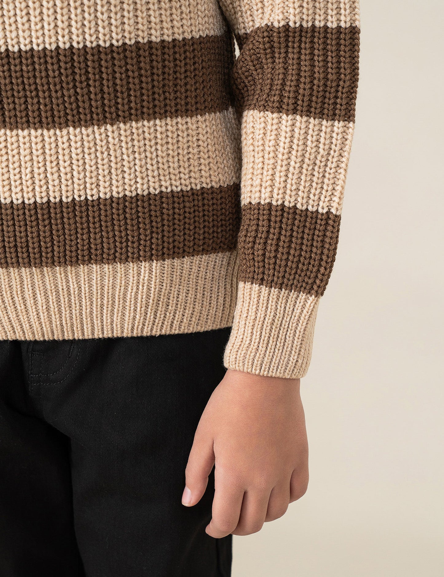 STRIPED KNITTED SWEATER