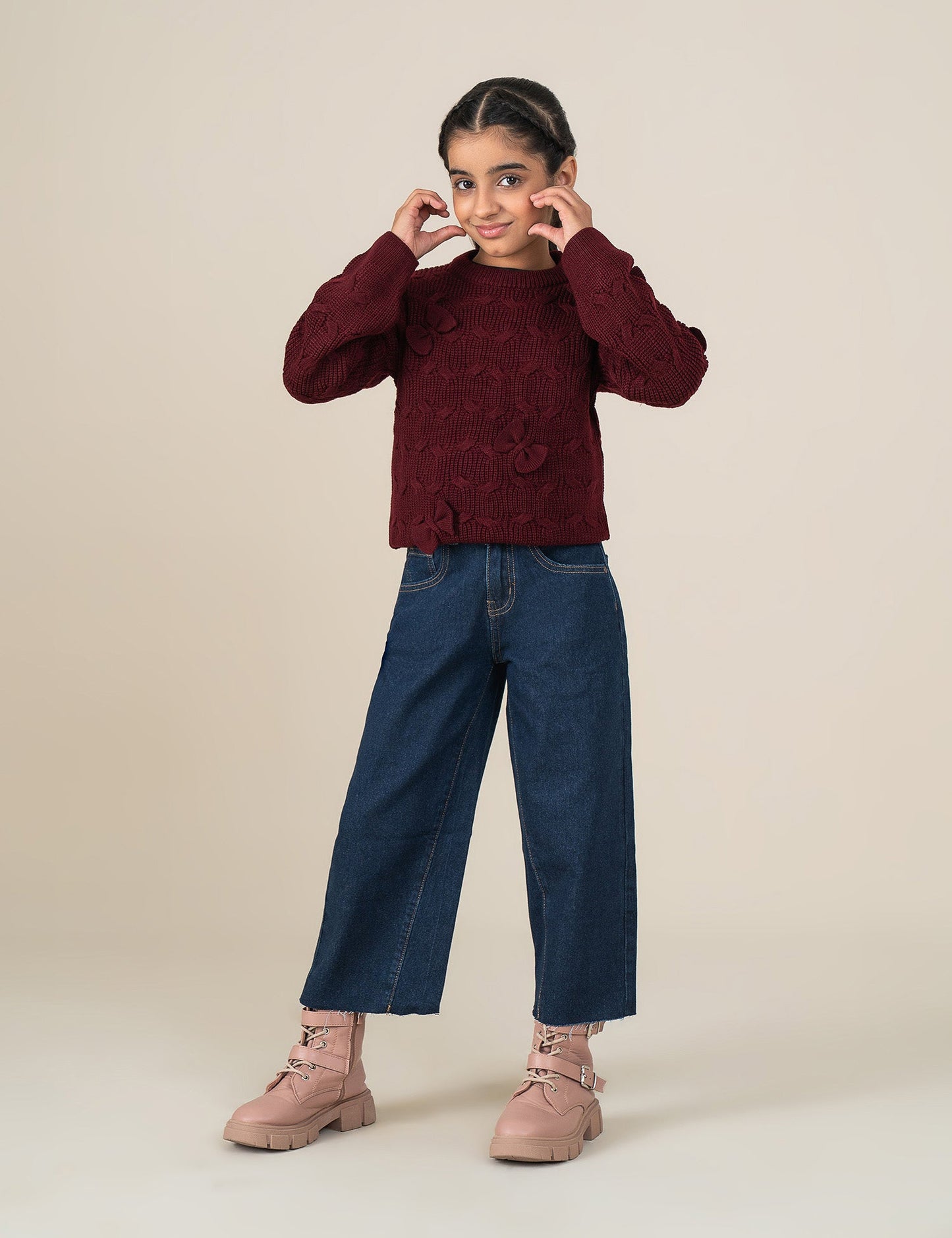 KNITTED SWEATER WITH BOW ACCENTS