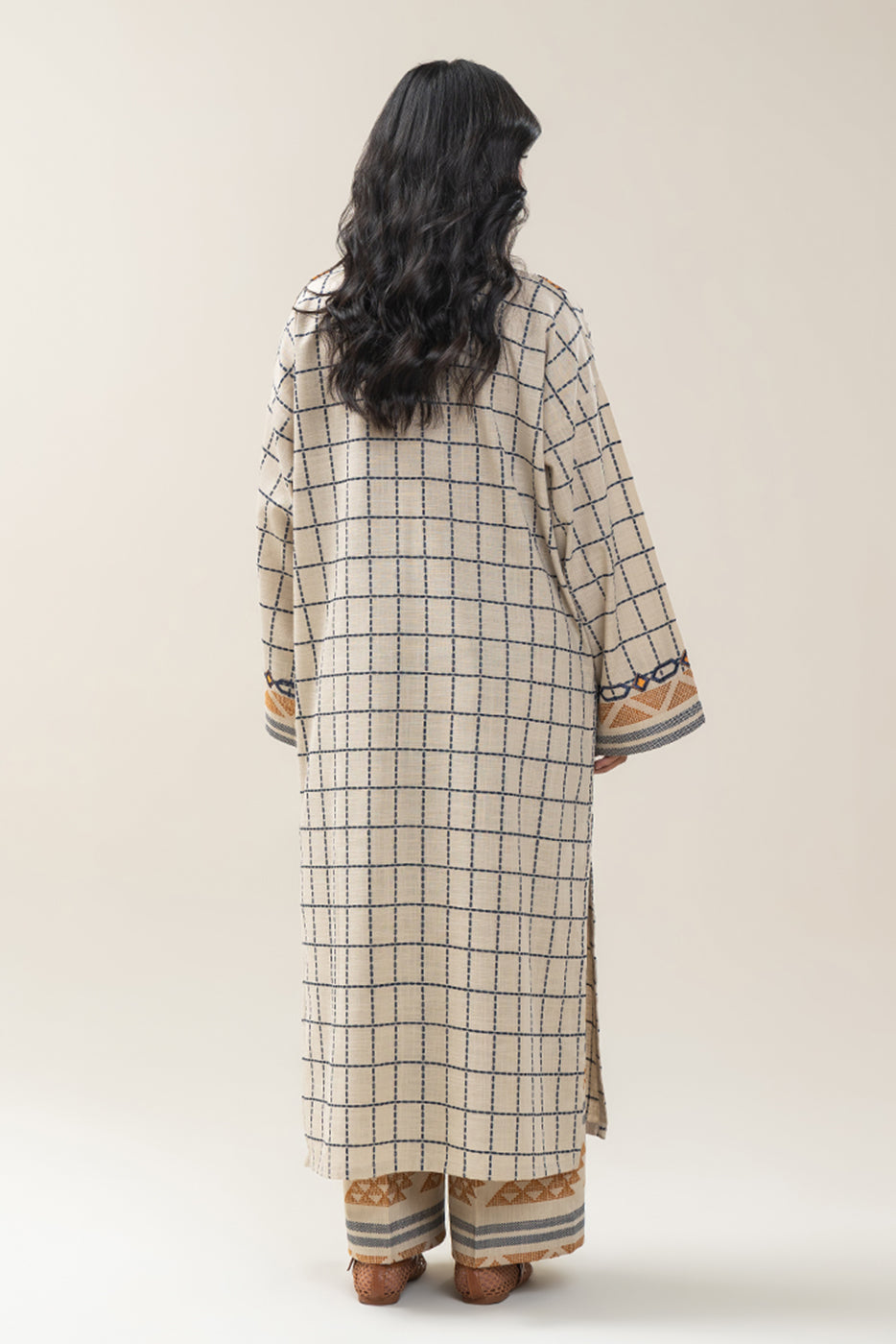 2 PIECE EMBROIDERED KHADDAR JACQUARD SUIT (PRET)